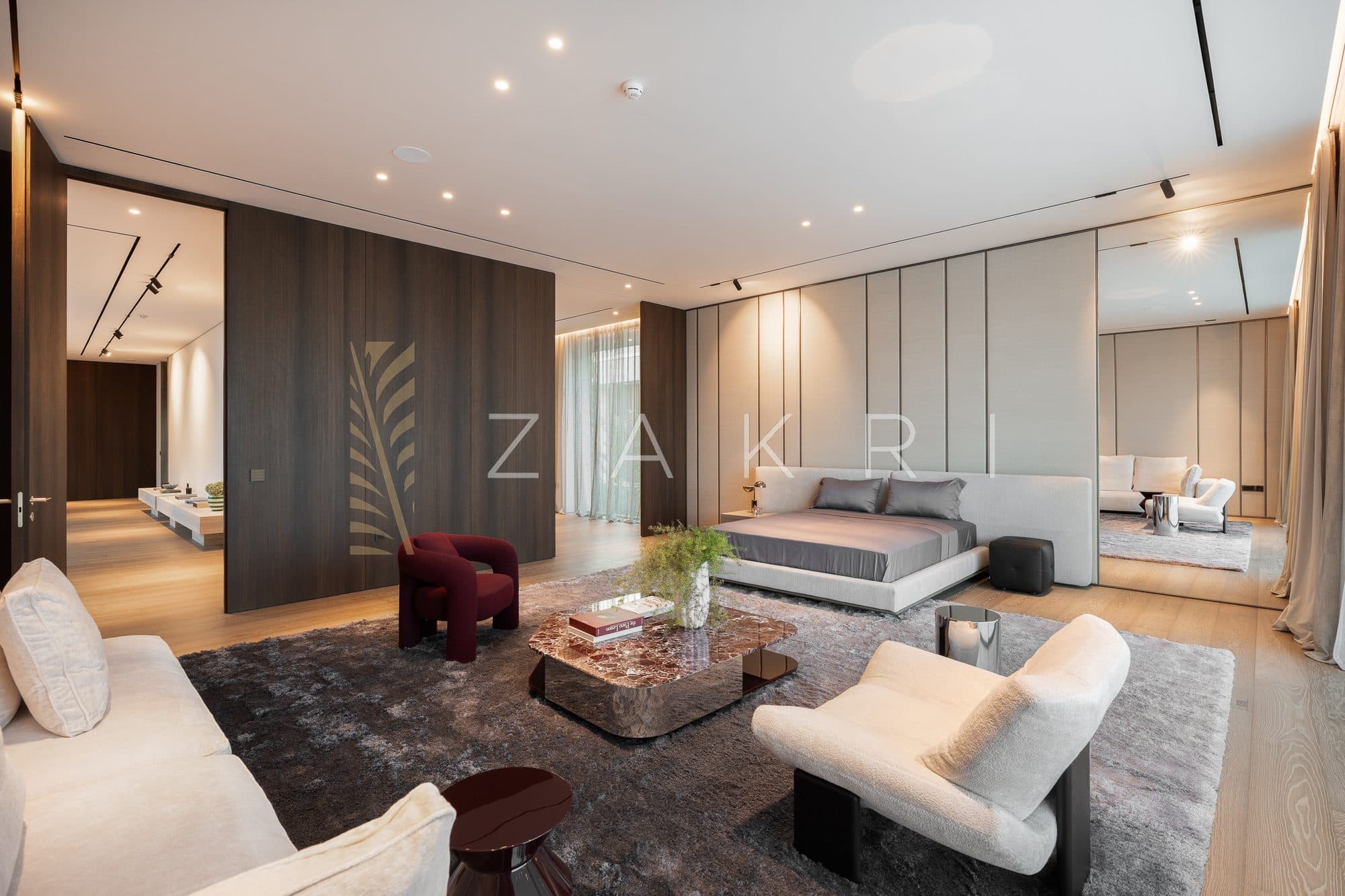A bedroom suite with its own seating area