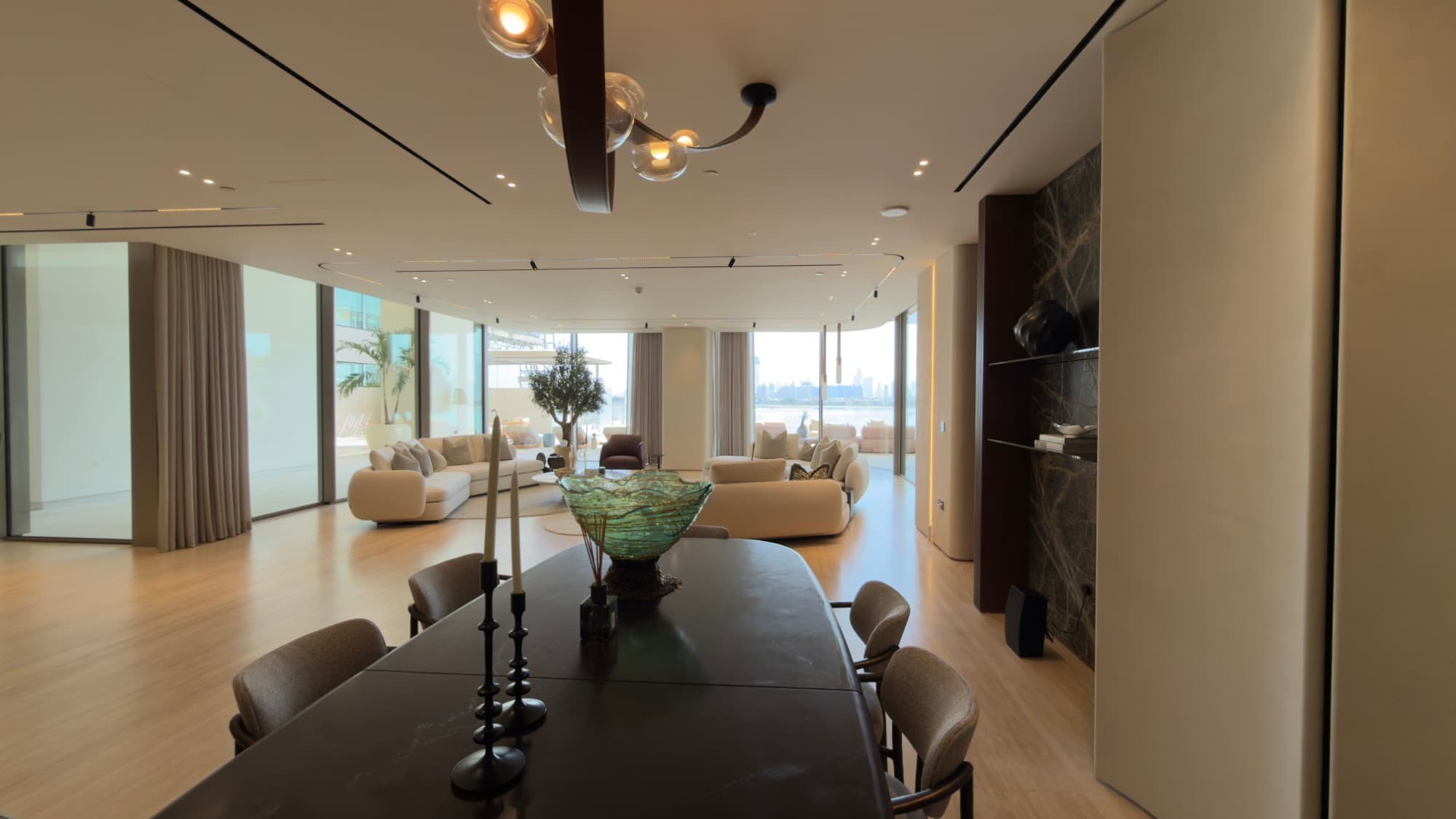The dining area looking through to the living space and the water beyond