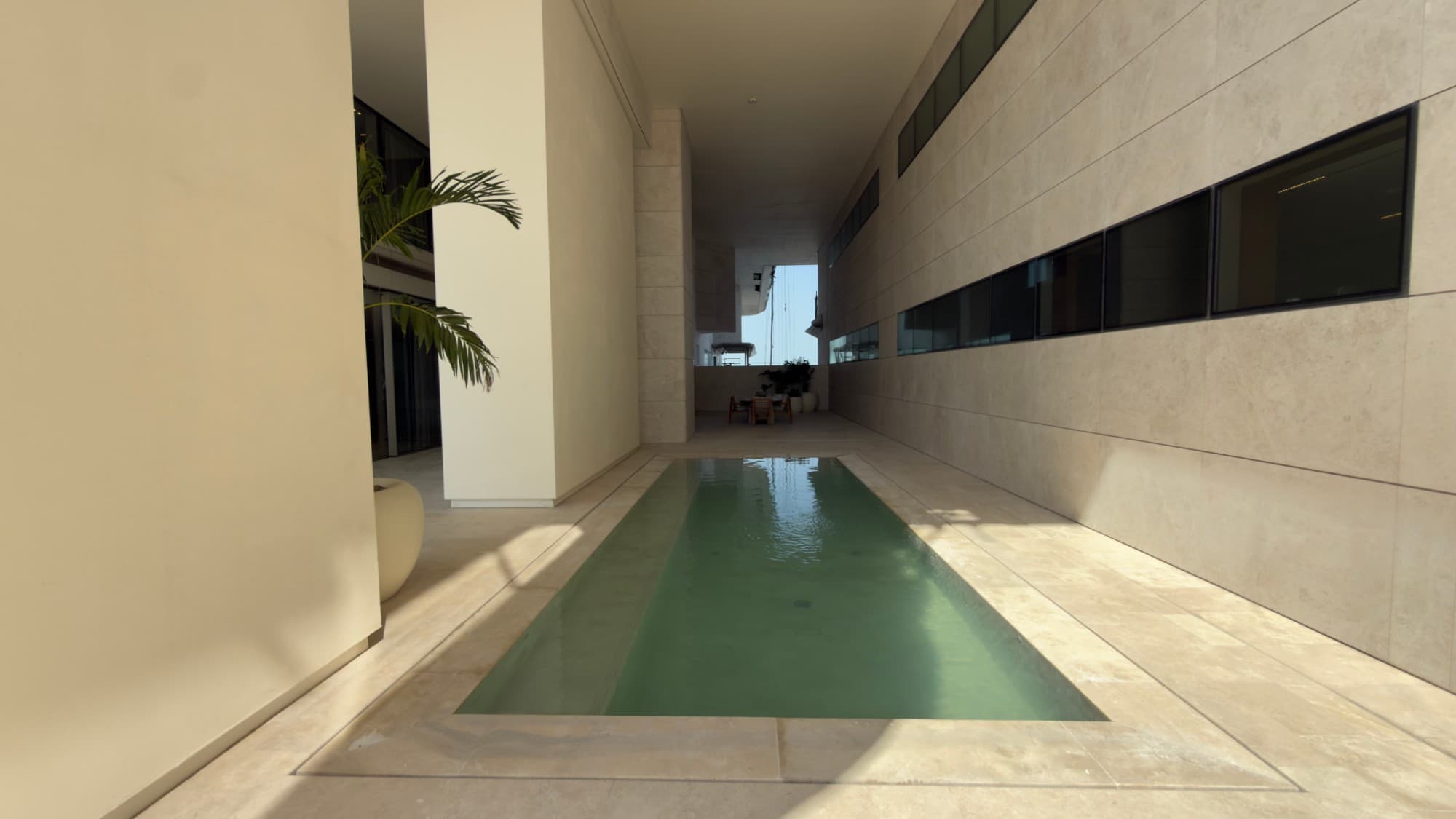The private pool running along the terrace