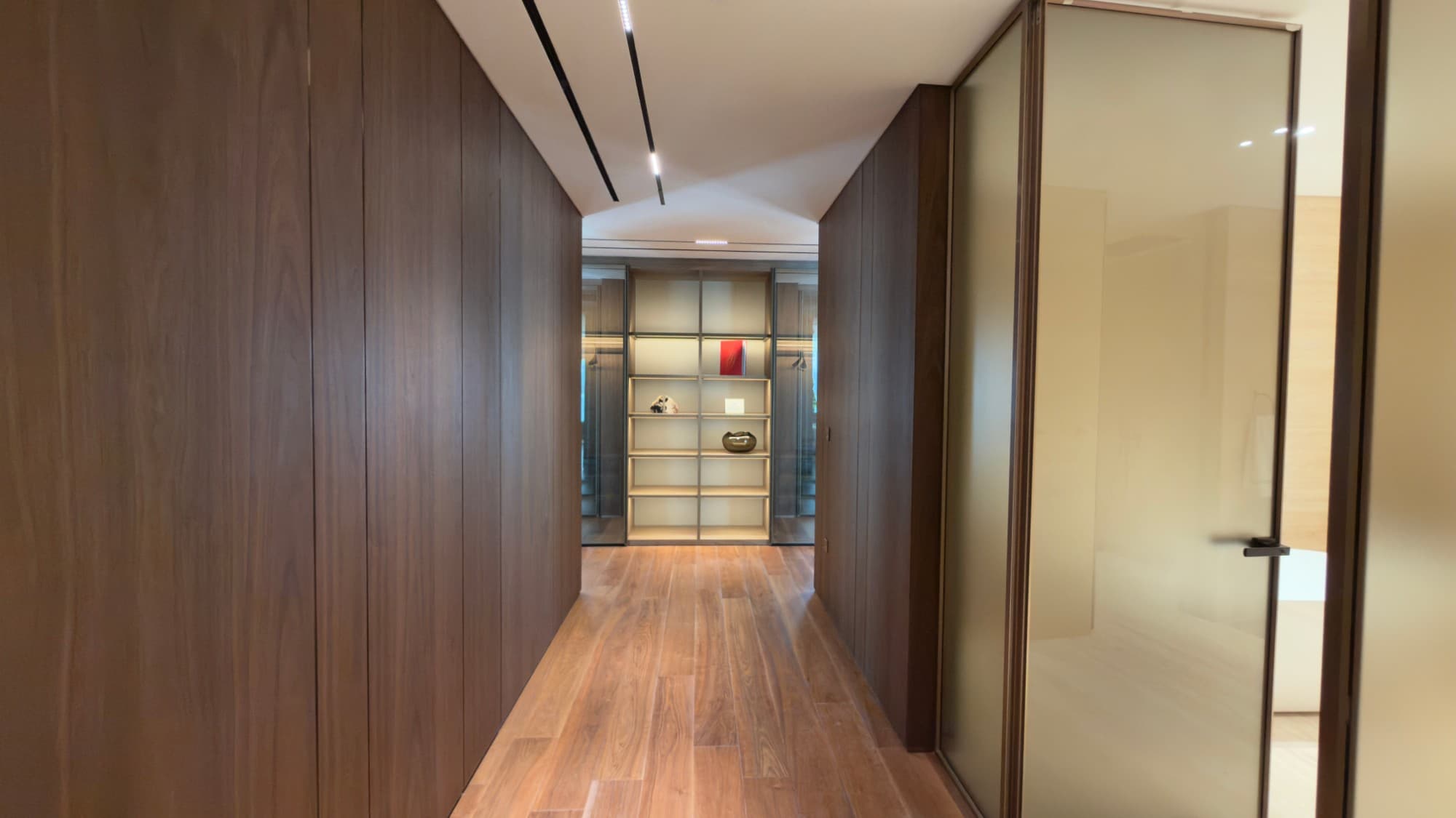 The walnut-panelled passage to the dressing room