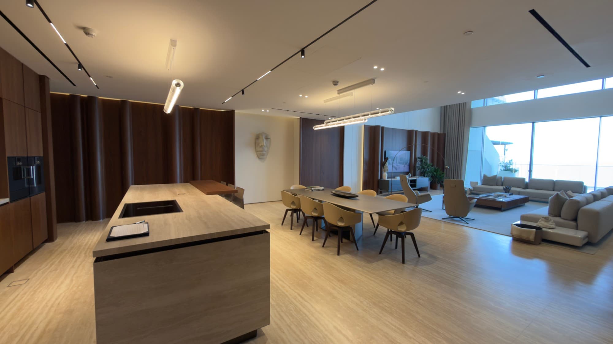 The open kitchen, with the dining area and the living room beyond